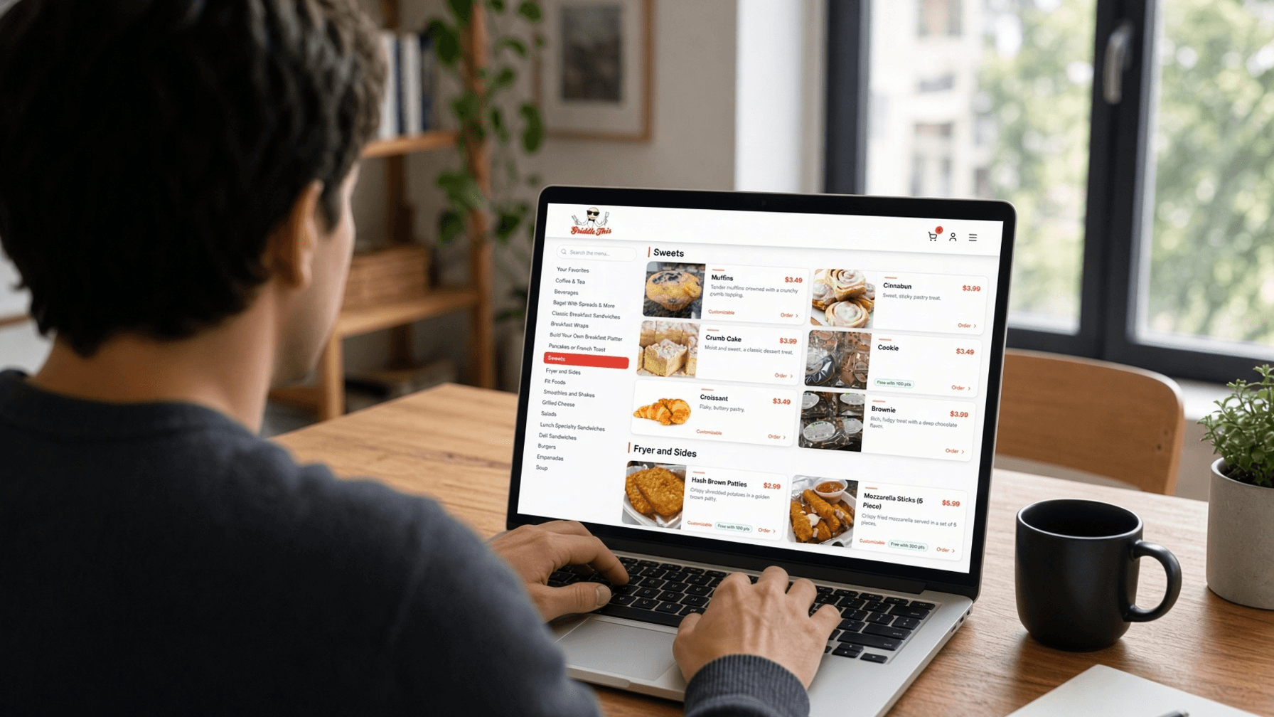 A customer browsing restaurant menu rewards on their laptop